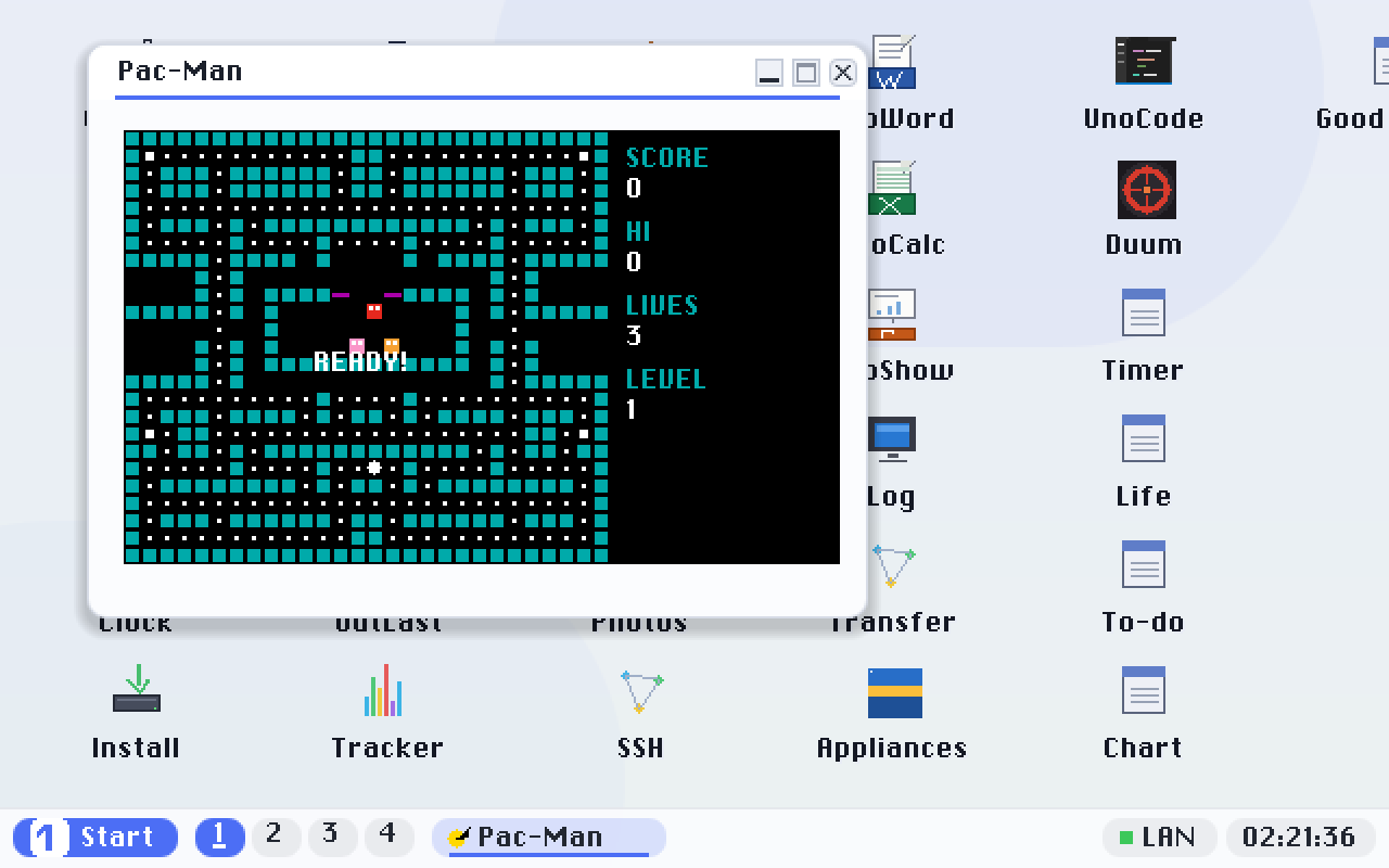 Pac-Man: maze, dots, power pellets and ghosts, with score, high score, lives and level in the panel beside the maze. A siren loops under the play and speeds up while the ghosts are frightened.